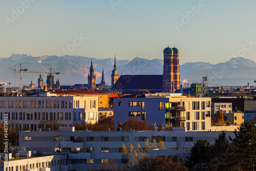 Munich skyline Frauenkirche with the alps in the background