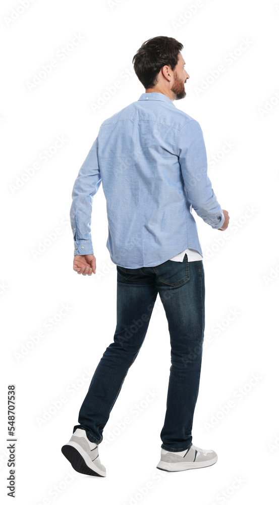 Handsome man in stylish outfit walking on white background, back view Handsome man in stylish outfit walking on white background, back view