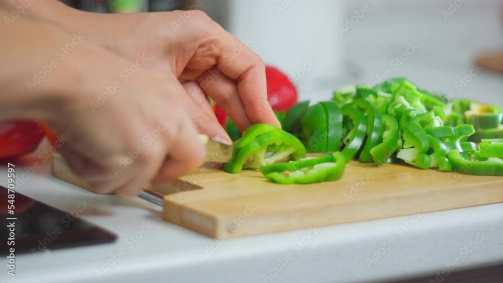 Slices green peppers, which is added to the food to give the taste of the dish Slices green peppers, which is added to the food to give the taste of the dish
