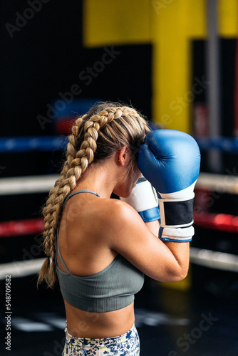 Young adult woman training on the ring © santypan
