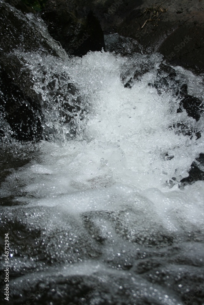 water flowing over rocks