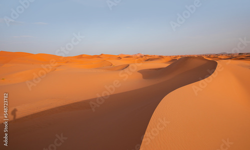 Beautiful sand dunes in the Sahara desert with amazing sunset sky - Sahara  Morocco