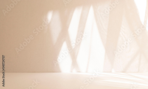 Obraz na płótnie Minimalistic abstract gentle light beige background for product presentation with light and shadow of window curtains on wall. w salonie