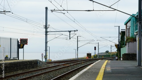 Rail road surrounded by buildings in Bray photo