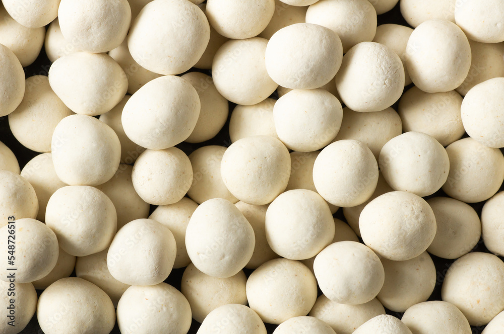 White Soy-covered Peanuts with sauce in wooden bowl, traditional turkish coated nut White Soy-covered Peanuts with sauce in wooden bowl, traditional turkish coated nut