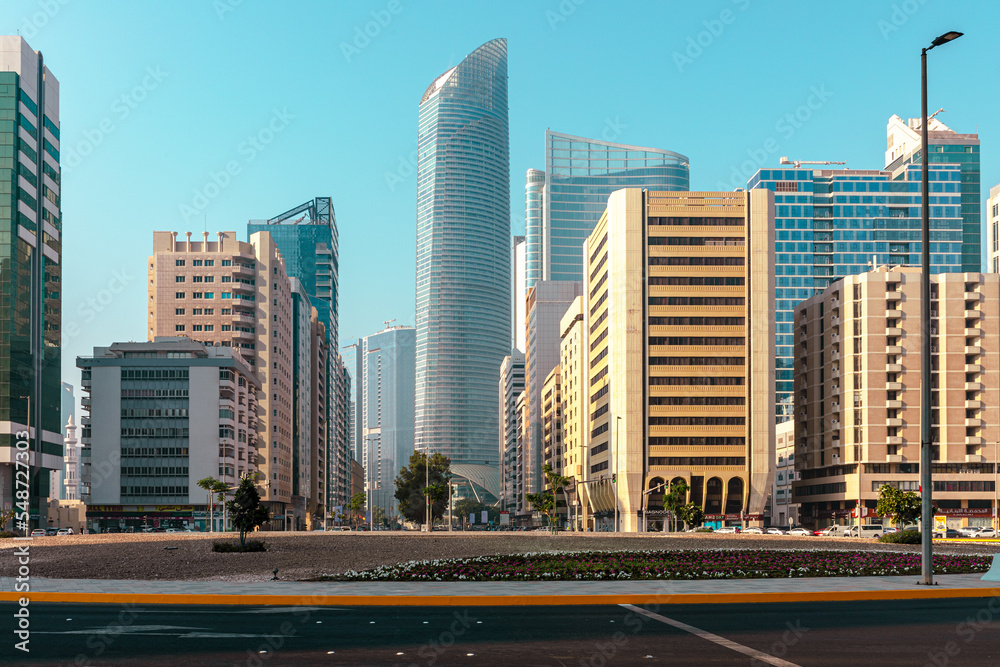 Abu Dhabi Streets and Skyscrapers. Tall Modern Glass Buildings in Abu