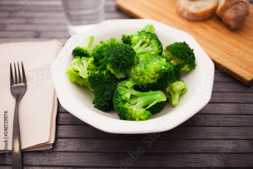 boiled broccoli inflorescences in plate