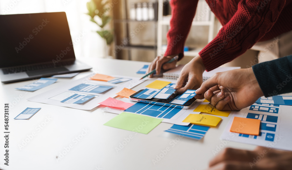 Best Designers for Your UX Team working in office, start up people working as overall layout, typography, patterns, iconography.