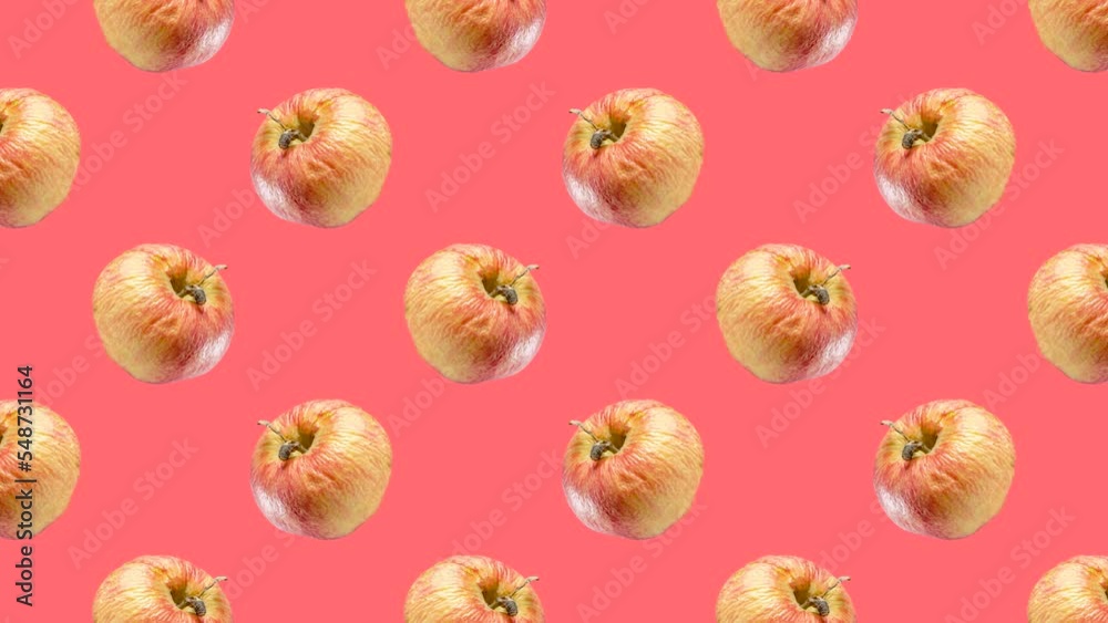 Rotten apples in geometric grid in seamless loop pattern on a coral background. Exotic fruits in seamless loop animation. Endless food motion graphic background Rotten apples in geometric grid in seamless loop pattern on a coral background. Exotic fruits in seamless loop animation. Endless food motion graphic background