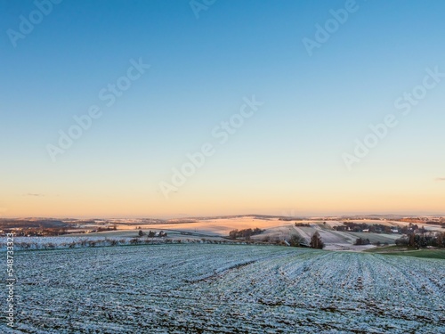 Scenic sunrise over the Orzechowce village in Poland, perfect for wallpaper photo