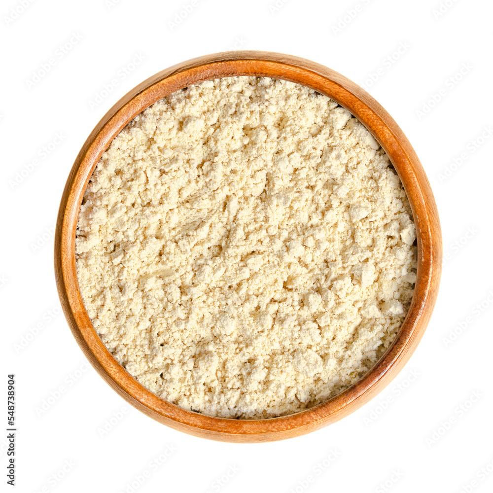 Soy flour, in a wooden bowl. Made of hulled, toasted soybeans, finely ground into a flour. Used for cooking or as the starting material for production of soy concentrate and soy protein isolate. Soy flour, in a wooden bowl. Made of hulled, toasted soybeans, finely ground into a flour. Used for cooking or as the starting material for production of soy concentrate and soy protein isolate.