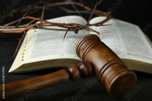 Fotografie, Obraz Judge gavel, bible and crown of thorns on black table, closeup