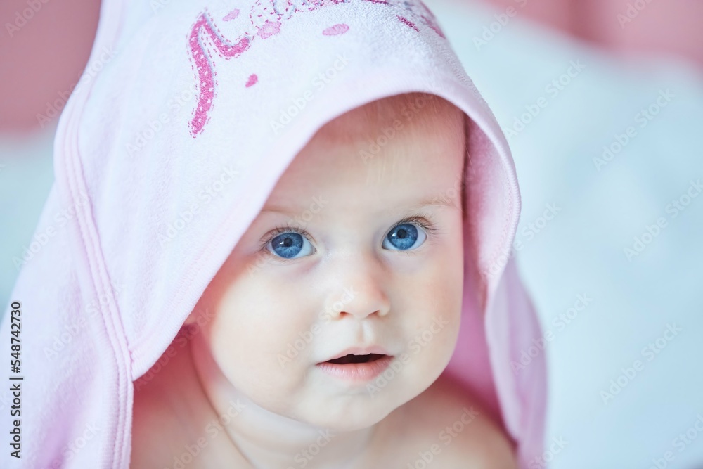 A small newborn baby girl. The concept of childhood A small newborn baby girl. The concept of childhood