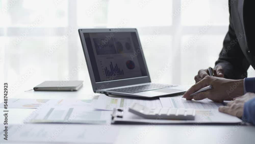 Financial accounting planning concept, meeting business people analyzing financial charts in business investments. and discuss the company's market growth strategy. 4k Financial accounting planning concept, meeting business people analyzing financial charts in business investments. and discuss the company's market growth strategy. 4k