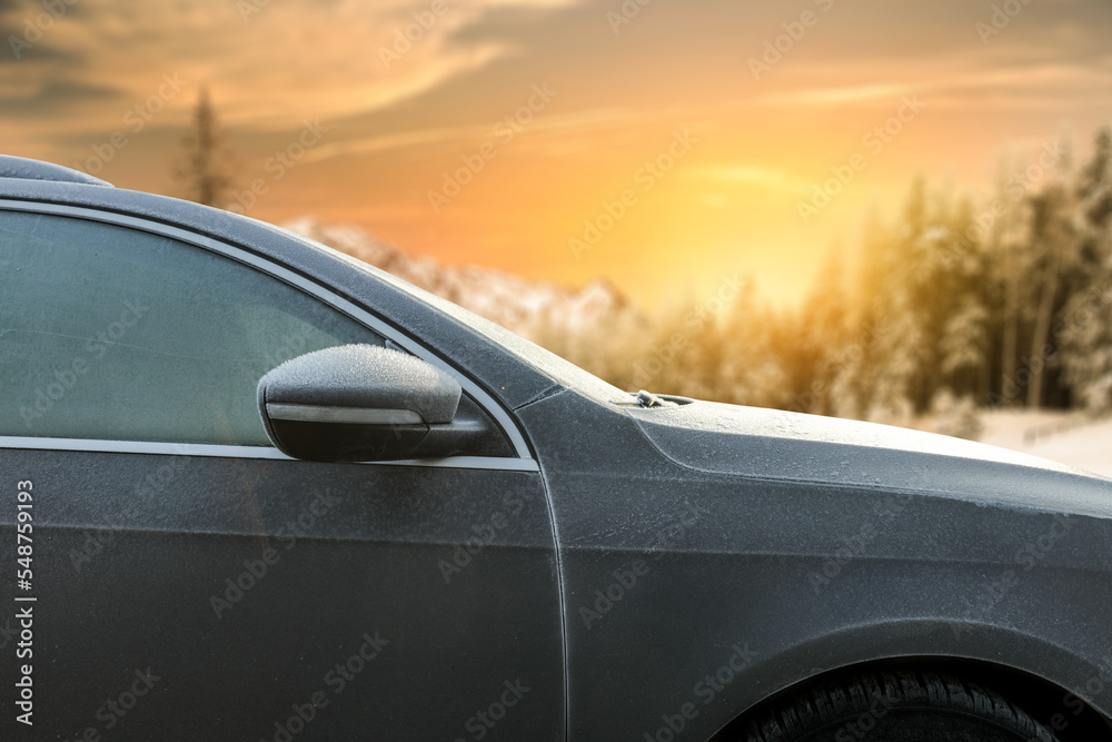 Winter car cover of frost and landscape of mountains. 