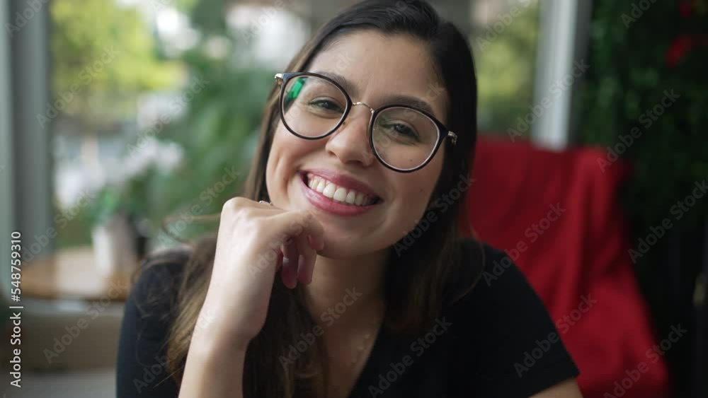 Charming young woman smiling at camera. Happy 20s girl with eyeglasses portrait face closeup Charming young woman smiling at camera. Happy 20s girl with eyeglasses portrait face closeup