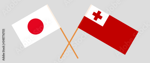 Crossed flags of Japan and Tonga. Official colors. Correct proportion