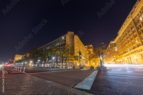 The J. Edgar Hoover Building, headquarters of the Federal Bureau of Investigation (FBI), in Washington, DC, seen at night from the intersection of Pennsylvania Avenue NW and 9th Street NW. photo