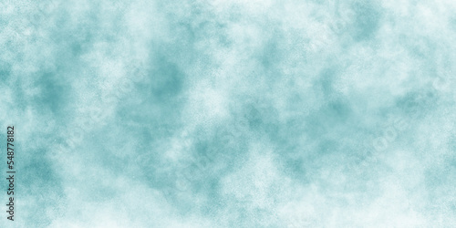 Beautiful shiny and blurry blue sky with clouds, soft blue grunge paper texture with smoke, blue texture for creative design and decoration.