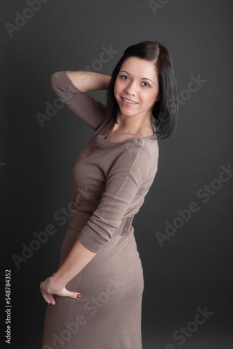 portrait of a cheerful girl in a dress © Maslov Dmitry