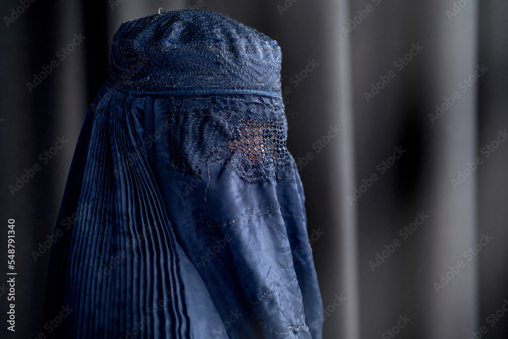 Side view, closeup of Muslim woman in Burka or Burqa, tradition cloths ...