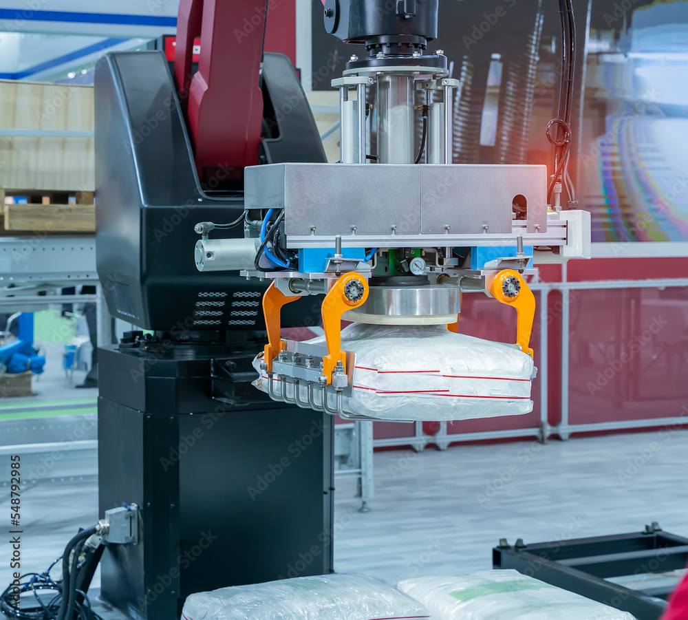 robot gripping and smart robot working on smart factory,industry 4.0 and technology. robot gripping and smart robot working on smart factory,industry 4.0 and technology.