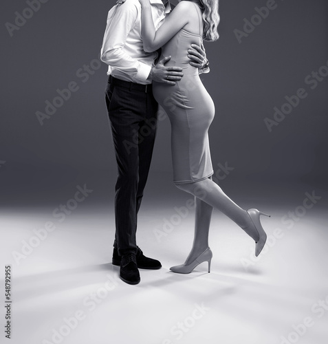pregnant couple posing in a studio, pregnant woman, studio pregnancy shoot, couple dancing tango
