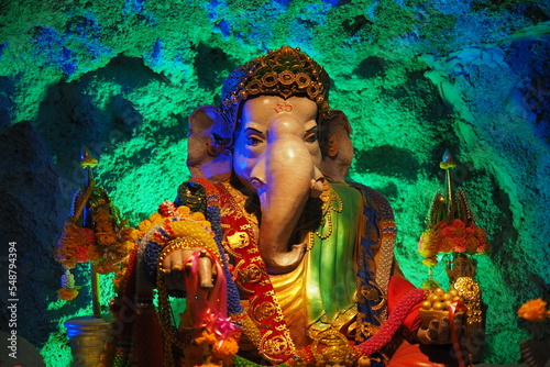 Ganesha statue (God of luck) in Hindu Buddhist temple © Tomimochi Studio