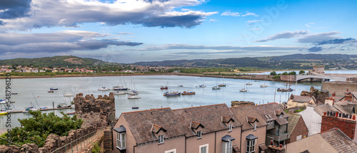 Obraz na płótnie Conwy town and The Castle, the awesome landmark medieval fortress in Wales, UK captured at sunset w salonie