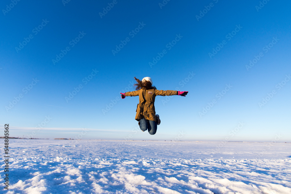 girl jumping in the sky - obrazy, fototapety, plakaty 