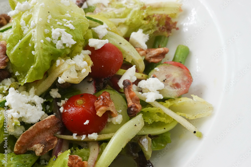 Close up Greek Salad on white plate Close up Greek Salad on white plate