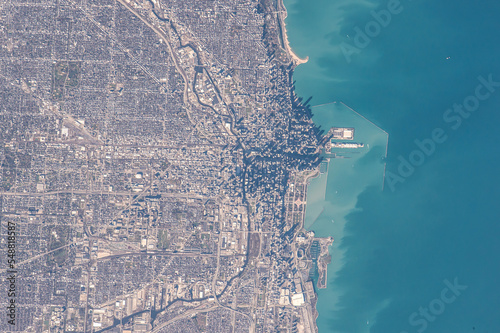 Fototapeta Naklejka Na Ścianę i Meble -  Aerial view of Chicago, Illinois as seen from space. Digitally enhanced. Elements of this image furnished by NASA. 