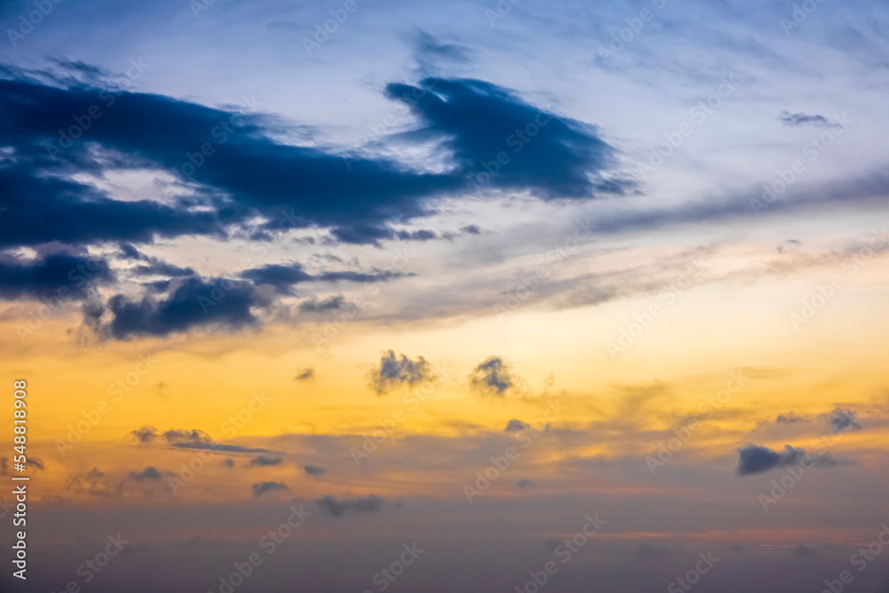 Calm sea with sunset sky and sun through the clouds over. Meditation ocean and sky background. Tranquil seascape. Horizon over the water