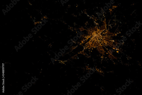 Fototapeta Naklejka Na Ścianę i Meble -  Night aerial space view over Budapest, Hungary seen from space. City lights light up the area. Digitally enhanced. The elements of this image furnished by NASA.