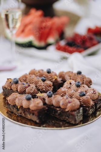Vertical of a chocolate dessert at a baby shower party.