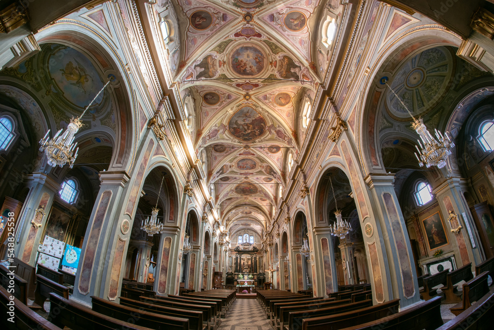 Boves, Italy - November 22, 2022: interior with frescoed vaults of parish church of san Bartolomeo in piazza dell'olmo (Elm tree square) with frescoed vaults