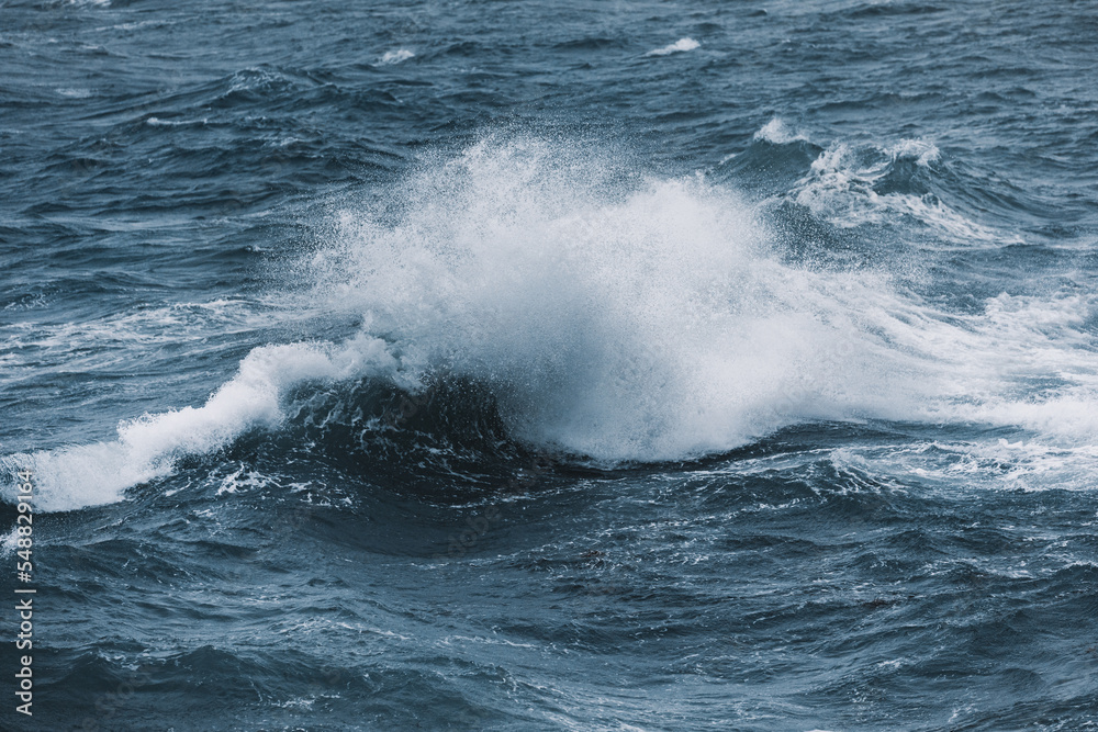 Wave in an ocean storm on a cold winter day Wave in an ocean storm on a cold winter day