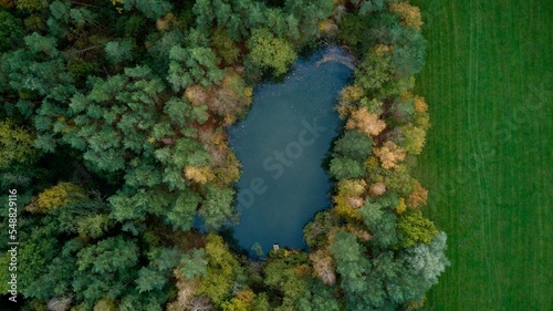 Aerial view of a pond in the woods near Walsrode, Germany photo