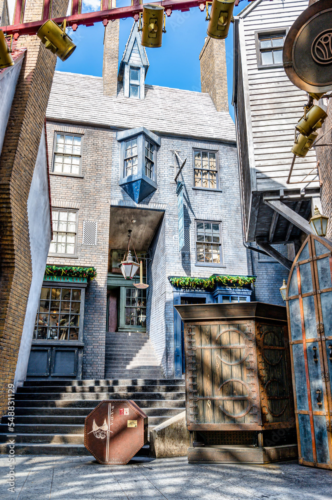 Fototapeta premium Orlando, Florida, United States. November 15 2022. Harry Potter Diagon Alley attraction at Universal Studios with Christmas season decorations.