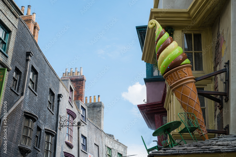 Fototapeta premium Orlando, Florida, United States. November 15 2022. Harry Potter Diagon Alley attraction at Universal Studios with Christmas season decorations.