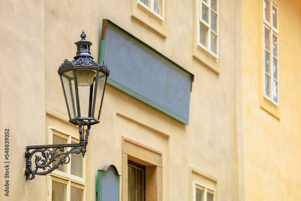 Street lamp, element of European touristic cozy city. Background with selective focus and copy space