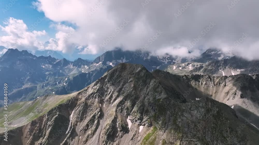 Air view. Distance from the top of the mountain with low clouds. video background highlands highlands Air view. Distance from the top of the mountain with low clouds. video background highlands highlands