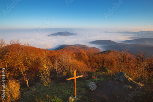 Predikálószék the famous Hungarian peak with gorgeous view, not far from Budapest. Gorgeous view of valley covered in thick fog from the famous spot called Prédikálószék located not far from Budapest 