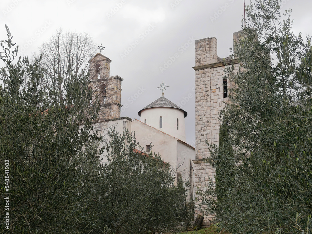The Krupa Monastery among the trees, an Orthodox monastery on the Krupa river, Croatia