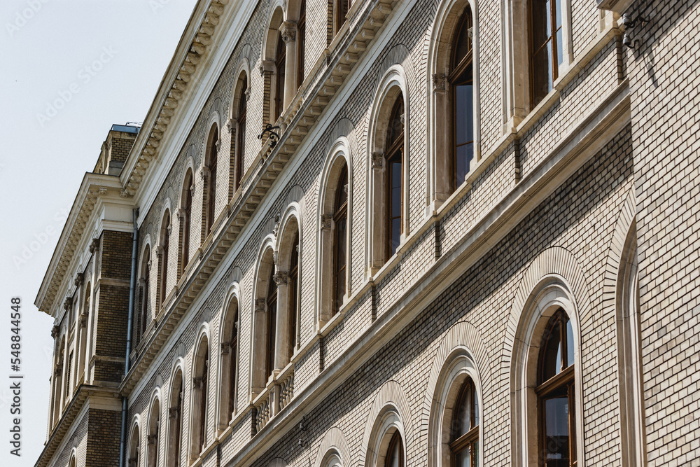 Fototapeta premium Vintage European building design made of bricks. Interwar architecture design