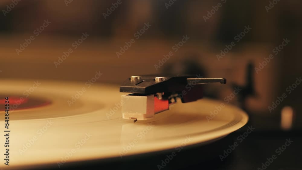 White Color LP Vinyl Disc Record Close-up Playing Music, Vintage old Vinil Player black phonograph spinning. Retro music player.