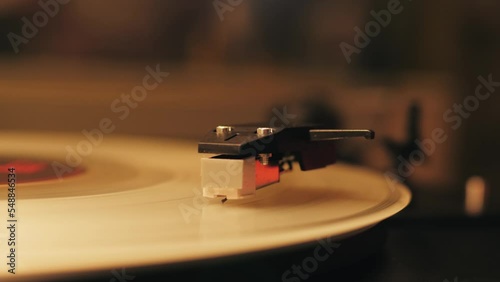 White Color LP Vinyl Disc Record Close-up Playing Music, Vintage old Vinil Player black phonograph spinning. Retro music player.