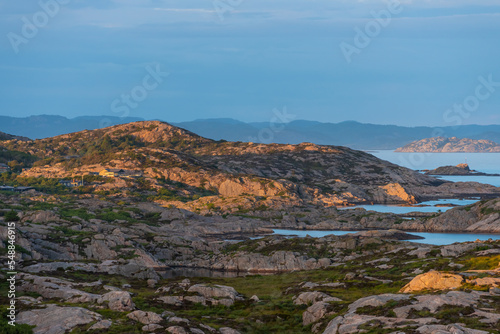 Evening view over barren cliffs along the coast.