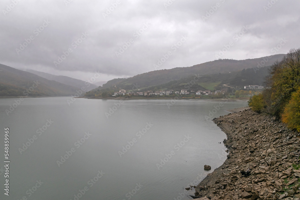 Eugi and its reservoir on a gray autumn day. Esteribar, Navarra