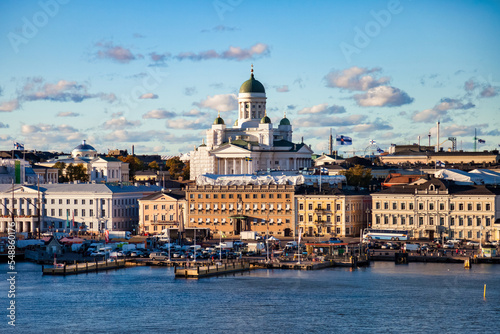 Aerial scenery panorama view city embankment of Helsinki, capital of Finland with blue evening sky. Background of amazing urban scenic view of Scandinavian finnish architecture. Copy text space